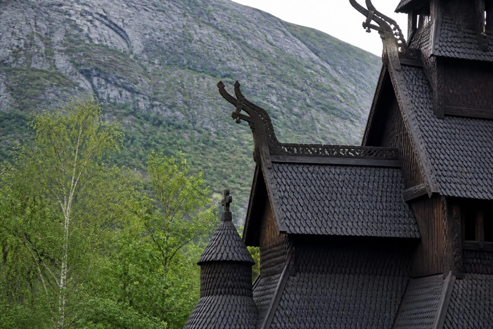 Carved timber roof and shingles of a Norwegian stave church